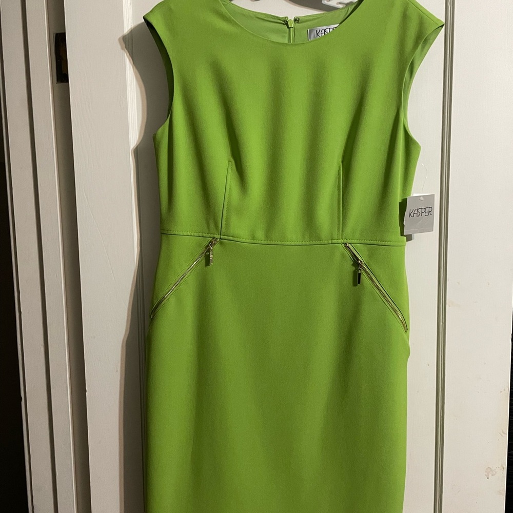 Short sleeve, tea length, lined dress.